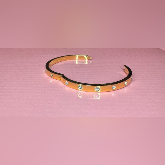 Kate Spade Stone Hinged Bangle in gold-tone plate with crystal embellishments. - Picture 5 of 5